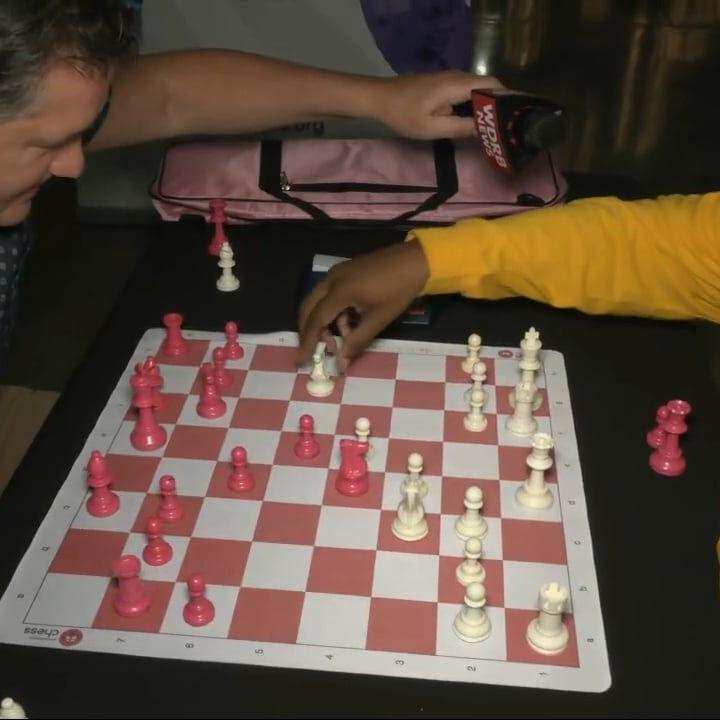 Keith gets schooled in chess at Give for Good Louisville
